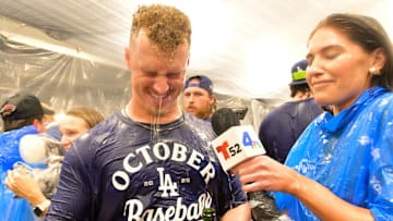 Oct 1, 2025; Los Angeles, California, USA; Los Angeles Dodgers relief pitcher Jack Dreyer (86) celebrates in the clubhouse after defeating the Cincinnati Reds in game two of the Wildcard round for the 2025 MLB playoffs at Dodger Stadium. Mandatory Credit: Jayne Kamin-Oncea-Imagn Images
