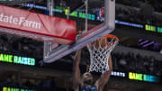 Apr 8, 2022; Dallas, Texas, USA; Dallas Mavericks forward Reggie Bullock (25) dunks the ball against the Portland Trail Blazers during the first quarter at the American Airlines Center. Mandatory Credit: Jerome Miron-USA TODAY Sports