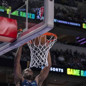 Apr 8, 2022; Dallas, Texas, USA; Dallas Mavericks forward Reggie Bullock (25) dunks the ball against the Portland Trail Blazers during the first quarter at the American Airlines Center. Mandatory Credit: Jerome Miron-USA TODAY Sports