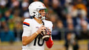 Virginia quarterback Anthony Colandrea (10) looks for an open receiver during a NCAA college football game against Notre Dame 
