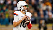 Former Virginia quarterback Anthony Colandrea (10) looks for an open receiver during a NCAA college football game against Notre Dame at Notre Dame Stadium on Saturday, Nov. 16, 2024, in South Bend.