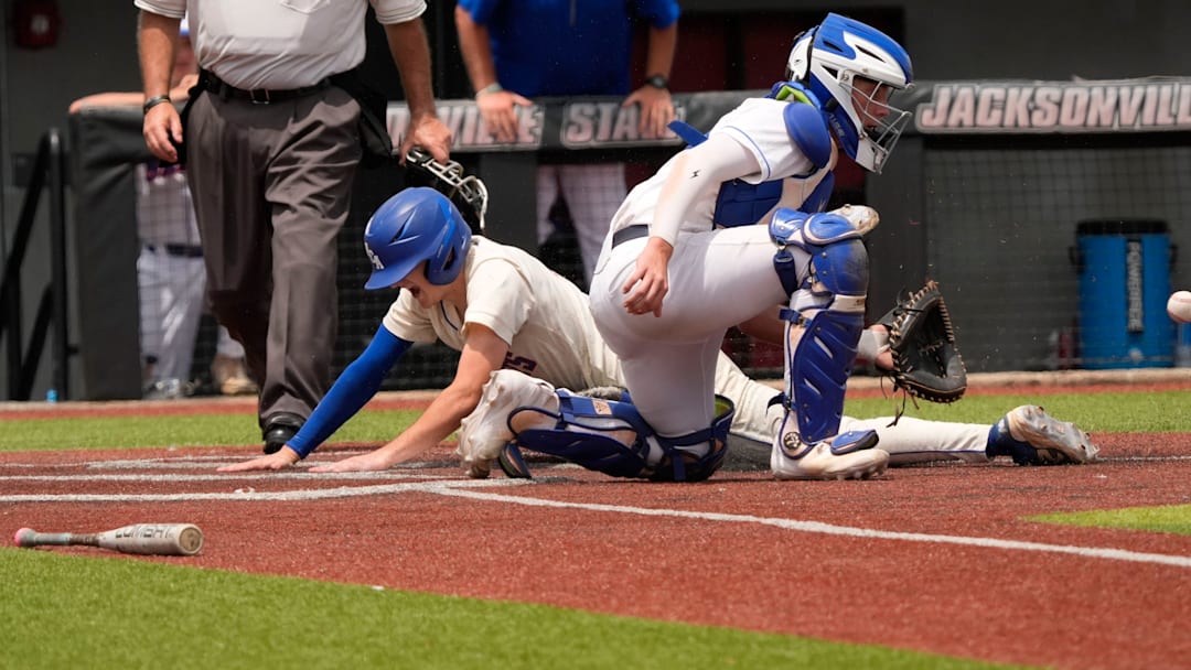 May 16, 2025; Tuscaloosa, AL, USA; ACA's Cade Durrett (10) scores as the ball comes late to St. Paul's John Stowers (20) at Jacksonville State University. ACA came from four runs down to win 7-5 and claim the 5A AHSAA baseball championship.