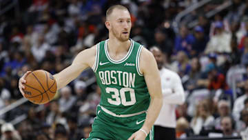 Oct 26, 2025; Detroit, Michigan, USA; Boston Celtics forward Sam Hauser (30) dribbles in the first half against the Detroit Pistons at Little Caesars Arena. Mandatory Credit: Rick Osentoski-Imagn Images