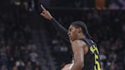 Oct 29, 2024; Salt Lake City, Utah, USA; Utah Jazz forward Cody Williams (5) reacts to making a three point shot against the Sacramento Kings during the fourth quarter at Delta Center. Mandatory Credit: Rob Gray-Imagn Images