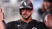 Chicago White Sox right fielder Mike Tauchman (18) celebrates with teammates after scoring against the Atlanta Braves at Truist Park. 