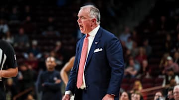 Dec 2, 2025; Columbia, South Carolina, USA; Virginia Tech Hokies head coach Mike Young directs his team against the South Carolina Gamecocks in the first half at Colonial Life Arena. Mandatory Credit: Jeff Blake-Imagn Images