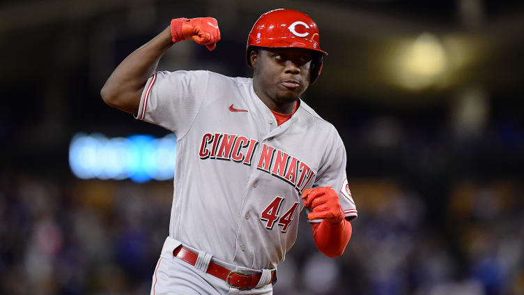 Cincinnati Reds left fielder Aristides Aquino (44) flexes.