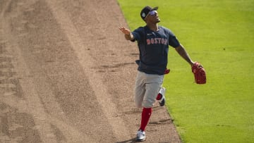 Ceddane Rafaela chases down a fly ball prior to a Red Sox spring training game.