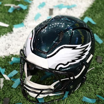 Feb 9, 2025; New Orleans, LA, USA; A Philadelphia Eagles player's helmet rests on the field after Super Bowl LIX against the Kansas City Chiefs at Caesars Superdome. Mandatory Credit: Geoff Burke-Imagn Images
