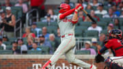 Jul 5, 2024; Atlanta, Georgia, USA; Philadelphia Phillies first baseman Alec Bohm (28) hits a single against the Atlanta Braves in the fourth inning at Truist Park. Mandatory Credit: Brett Davis-USA TODAY Sports