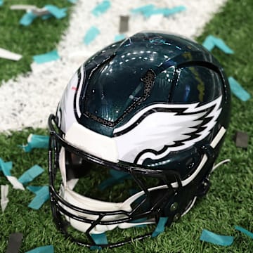 Feb 9, 2025; New Orleans, LA, USA; A Philadelphia Eagles player's helmet rests on the field after Super Bowl LIX against the Kansas City Chiefs at Caesars Superdome. Mandatory Credit: Geoff Burke-Imagn Images