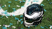 Feb 9, 2025; New Orleans, LA, USA; A Philadelphia Eagles player's helmet rests on the field after Super Bowl LIX against the Kansas City Chiefs at Caesars Superdome. Mandatory Credit: Geoff Burke-Imagn Images