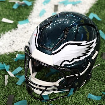 Feb 9, 2025; New Orleans, LA, USA; A Philadelphia Eagles player's helmet rests on the field after Super Bowl LIX against the Kansas City Chiefs at Caesars Superdome. Mandatory Credit: Geoff Burke-Imagn Images