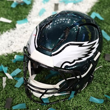 Feb 9, 2025; New Orleans, LA, USA; A Philadelphia Eagles player's helmet rests on the field after Super Bowl LIX against the Kansas City Chiefs at Caesars Superdome. Mandatory Credit: Geoff Burke-Imagn Images