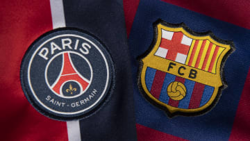 The Paris Saint-Germain and FC Barcelona Badges