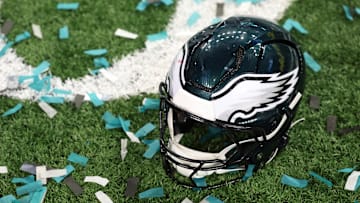 Feb 9, 2025; New Orleans, LA, USA; A Philadelphia Eagles player's helmet rests on the field after Super Bowl LIX against the Kansas City Chiefs at Caesars Superdome. Mandatory Credit: Geoff Burke-Imagn Images