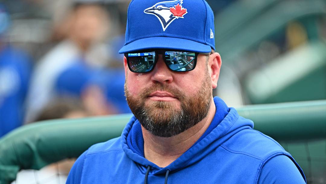 Blue Jays manager John Schneider (14) before a game. Credit: Eric Hartline-Imagn 