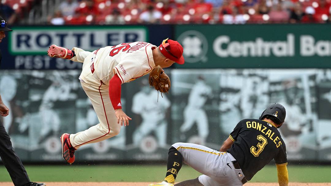 Aug 29, 2026; St. Louis, Missouri, USA;  Pittsburgh Pirates designated hitter Nick Gonzales (3) is tagged out stealing second base by St. Louis Cardinals shortstop JJ Wetherholt (26) in the seventh inning at Busch Stadium.  Mandatory Credit: Joe Puetz-Imagn Images