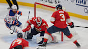 Jun 12, 2025; Sunrise, Florida, USA; Florida Panthers goaltender Sergei Bobrovsky (72) and defenseman Seth Jones (3) defend against Edmonton Oilers right wing Connor Brown (28) during the third period in game four of the 2025 Stanley Cup Final at Amerant Bank Arena.