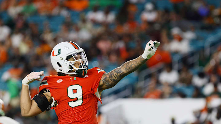 Sep 7, 2024; Miami Gardens, Florida, USA; Miami Hurricanes defensive lineman Tyler Baron (9) celebrates after sacking Florida A&M Rattlers quarterback Daniel Richardson (not pictured) during the third quarter at Hard Rock Stadium. Mandatory Credit: Sam Navarro-Imagn Images