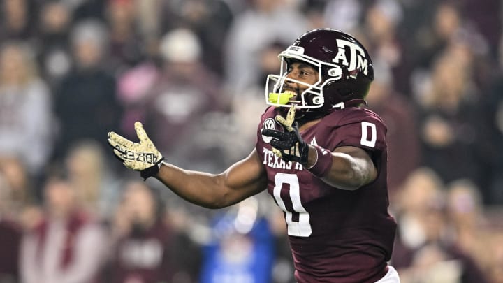 Nov 11, 2023; College Station, Texas, USA; Texas A&M Aggies wide receiver Ainias Smith (0) reacts during the first quarter against the Mississippi State Bulldogs at Kyle Field. Mandatory Credit: Maria Lysaker-USA TODAY Sports