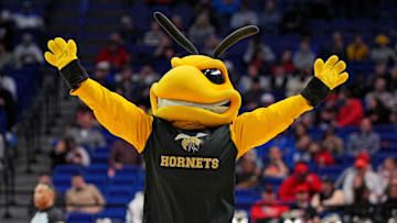 Mar 20, 2025; Lexington, KY, USA;  The Alabama State Hornets mascot cheers during the second half of the game between the Auburn Tigers and the Alabama State Hornets in the first round of the NCAA Tournament at Rupp Arena. Mandatory Credit: Aaron Doster-Imagn Images