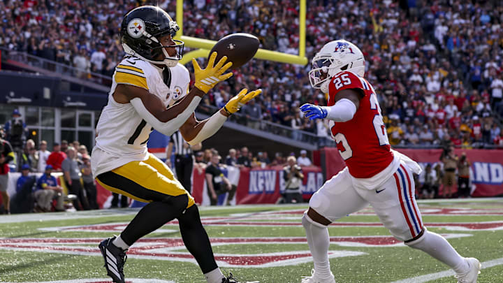 Sep 21, 2025; Foxborough, Massachusetts, USA; Pittsburgh Steelers wide receiver Calvin Austin III (19) scores the winning touchdown during the fourth quarter at Gillette Stadium. Mandatory Credit: Paul Rutherford-Imagn Images