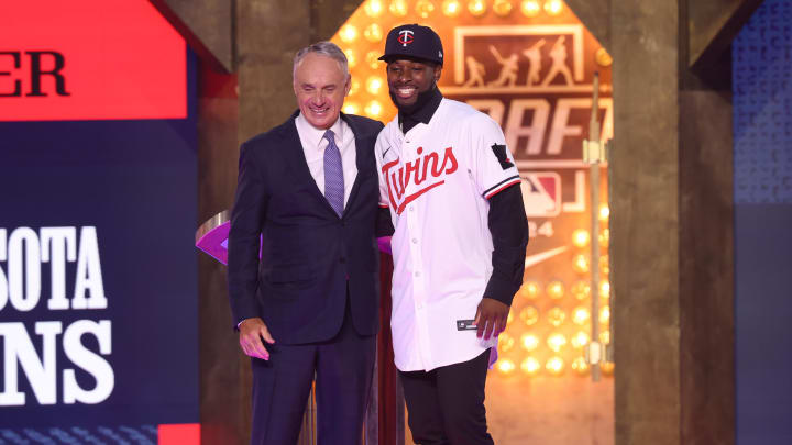 Jul 14, 2024; Ft. Worth, TX, USA;  MLB Commissioner Rob Manfred takes a photo with Kaelen Culpepper after he was drafted by the Minnesota Twins with the 21st pick during the first round of the MLB Draft at Cowtown Coliseum. Mandatory Credit: Kevin Jairaj-USA TODAY Sports