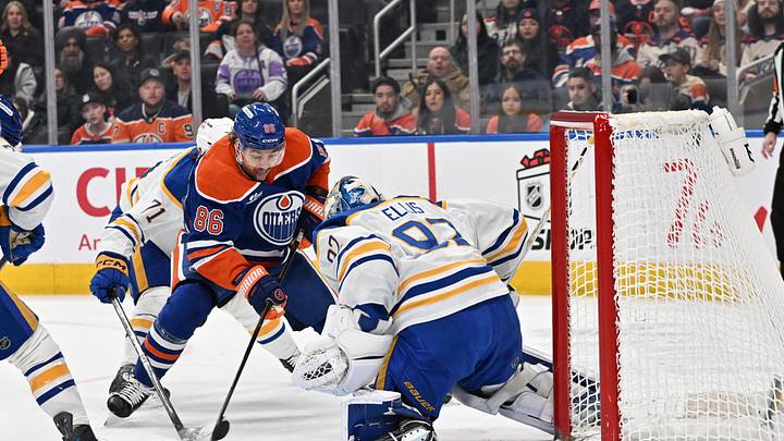 Dec 9, 2025; Edmonton, Alberta, CAN; Edmonton Oilers right winger David Tomasek 86) shoots the puck against  Buffalo Sabres goalie Colten Ellis (92) during the first period at Rogers Place. Mandatory Credit: Walter Tychnowicz-Imagn Images