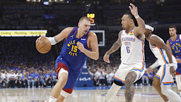 May 13, 2025; Oklahoma City, Oklahoma, USA; Denver Nuggets center Nikola Jokic (15) drives to the basket against Oklahoma City Thunder forward Jaylin Williams (6) during the second quarter of game five of the second round for the 2025 NBA Playoffs at Paycom Center. Mandatory Credit: Alonzo Adams-Imagn Images