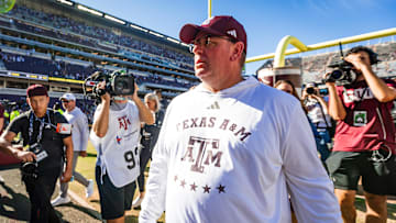 Nov 22, 2025; College Station, Texas, USA; Texas A&M Aggies head coach Mike Elko walks off the field after defeating the Samford Bulldogs 48-0 in a game at Kyle Field