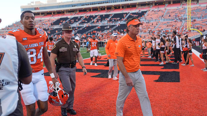 Oklahoma State coach Mike Gundy walks of the field after a college football game between the Oklahoma State Cowboys (OSU) and the West Virginia Mountaineers at Boone Pickens Stadium in Stillwater, Okla., Saturday, Oct. 5, 2024.