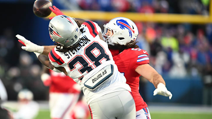 Dec 22, 2024; Orchard Park, New York, USA; Buffalo Bills linebacker Baylon Spector (54) is called for pass interference on New England Patriots running back Rhamondre Stevenson (38) in the first quarter Dec 22, 2024; Orchard Park, New York, USA; Buffalo Bills linebacker Baylon Spector (54) is called for pass interference on New England Patriots running back Rhamondre Stevenson (38) in the first quarter