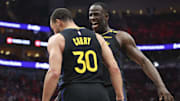 May 4, 2025; Houston, Texas, USA; Golden State Warriors forward Draymond Green (23) celebrates with guard Stephen Curry (30) during game seven of the first round for the 2025 NBA Playoffs against the Houston Rockets at Toyota Center. Mandatory Credit: Troy Taormina-Imagn Images