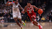 Feb 12, 2025; Atlanta, Georgia, USA; Stanford Cardinal guard Jaylen Blakes (21) dribbles past Georgia Tech Yellow Jackets forward Darrion Sutton (10) in the first half at McCamish Pavilion. Mandatory Credit: Brett Davis-Imagn Images