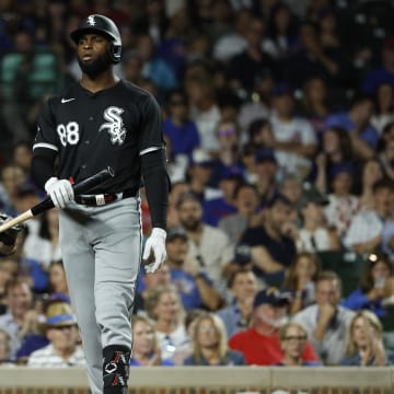 Jun 5, 2024; Chicago, Illinois, USA; Chicago White Sox center fielder Luis Robert Jr. (88) reacts after striking out against the Chicago Cubs during the ninth inning at Wrigley Field.
