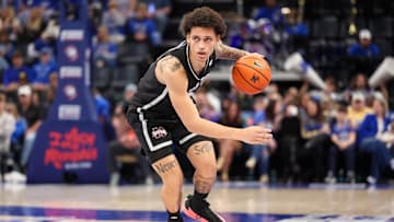 Dec 21, 2024; Memphis, Tennessee, USA; Mississippi State Bulldogs guard Riley Kugel (2) dribbles the ball against the Memphis Tigers during the second half at FedExForum. Mandatory Credit: Wesley Hale-Imagn Images