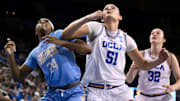 Mar 21, 2025; Los Angeles, California, USA; Southern Lady Jaguars forward DeMya Porter (24) and UCLA Bruins center Lauren Betts (51) jockey for rebounding position during the third quarter of an NCAA Tournament first-round game at Pauley Pavilion presented by Wescom. Mandatory Credit: Robert Hanashiro-Imagn Images