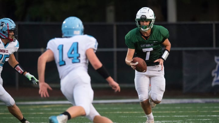 Owensboro Catholic   s Brady Atwell (7) carries the ball as the Union County Braves play the Owensboro Catholic Aces at Steele Stadium in Owensboro, Ky., Friday evening, Sept. 3, 2021.

Union Vs Oc 11