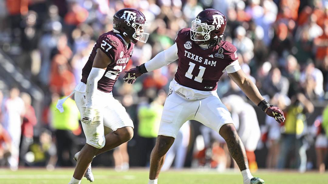 Dec 20, 2025; College Station, TX, USA; Texas A&M Aggies linebacker Daymion Sanford (27) reacts with defensive tackle Tyler Onyedim (11) after recovering a fumble against the Miami Hurricanes during the second half of the first round game of the CFP National Playoff at Kyle Field. Mandatory Credit: Maria Lysaker-Imagn Images Dec 20, 2025; College Station, TX, USA; Texas A&M Aggies linebacker Daymion Sanford (27) reacts with defensive tackle Tyler Onyedim (11) after recovering a fumble against the Miami Hurricanes during the second half of the first round game of the CFP National Playoff at Kyle Field. Mandatory Credit: Maria Lysaker-Imagn Images