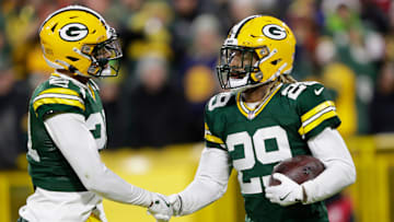 Green Bay Packers safety Xavier McKinney (29) celebrates intercepting a pass against San Francisco 49ers quarterback Brandon Allen with cornerback Carrington Valentine (24) during their football game Sunday, November 24, 2024, at Lambeau Field in Green Bay, Wisconsin.