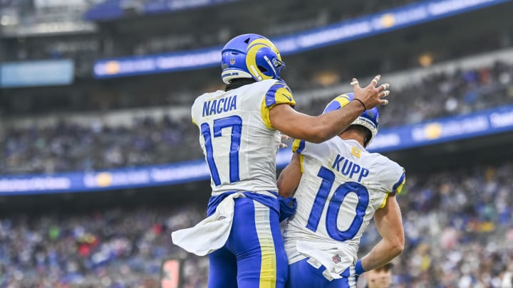 Dec 10, 2023; Baltimore, Maryland, USA;  Los Angeles Rams wide receiver Cooper Kupp (10) celebrates with wide receiver Puka Nacua (17) after scoring a second quarter touchdown  during the  at M&T Bank Stadium. Mandatory Credit: Tommy Gilligan-USA TODAY Sports