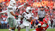 Mississippi State Bulldogs cornerback DeAgo Brumfield (4) reacts after an interception against the Georgia Bulldogs in the third quarter at Sanford Stadium.