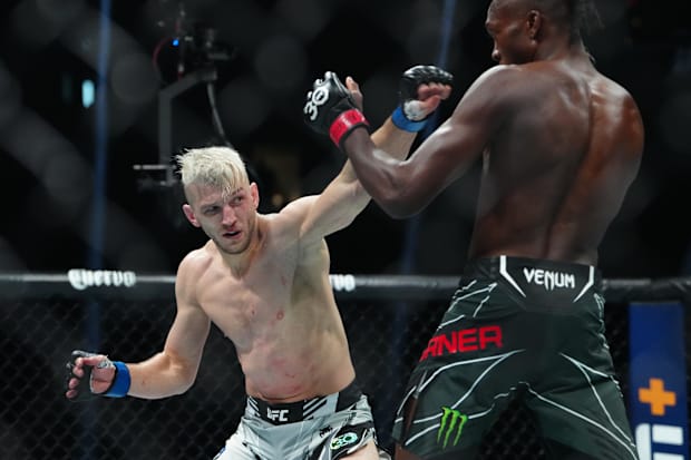Jalin Turner fights Dan Hooker during UFC 290 at T-Mobile Arena. 