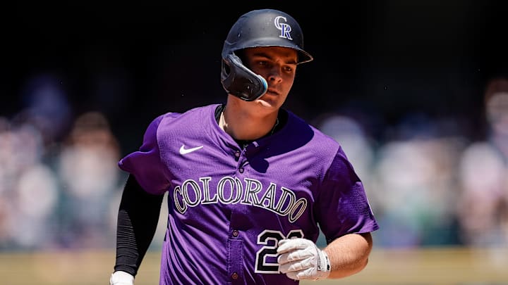 Colorado Rockies right fielder Mickey Moniak (22) rounds the bases on a three run home run in the fifth inning against the Arizona Diamondbacks at Coors Field. Colorado Rockies right fielder Mickey Moniak (22) rounds the bases on a three run home run in the fifth inning against the Arizona Diamondbacks at Coors Field.