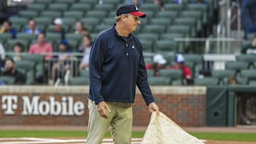 May 3, 2025; Cumberland, Georgia, USA; General views of the field and grounds crew during a rain delay before the start of the game between the Los Angeles Dodgers against the Atlanta Braves at Truist Park. Mandatory Credit: Dale Zanine-Imagn Images