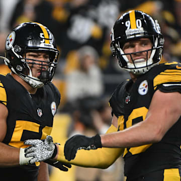 Oct 28, 2024; Pittsburgh, Pennsylvania, USA; Pittsburgh Steelers linebacker Alex Highsmith (56) celebrates with  T.J. Watt (90) after sacking New York Giants quarterback Daniel Jones (8) during the third quarter at Acrisure Stadium. Mandatory Credit: Barry Reeger-Imagn Images