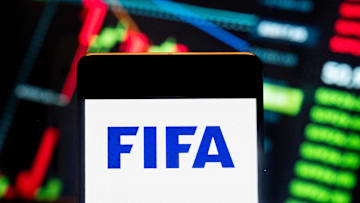 In this photo illustration, the Federation Internationale de...
