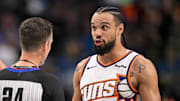 Nov 12, 2025; Dallas, Texas, USA; Phoenix Suns forward Dillon Brooks (3) argues a call with referee Kevin Scott (24) as guard Grayson Allen (8) looks on during the second half against the Dallas Mavericks at the American Airlines Center. Mandatory Credit: Jerome Miron-Imagn Images