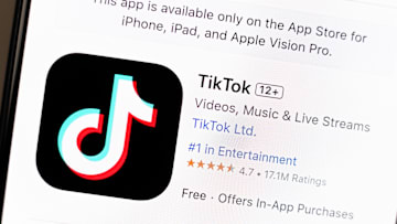 In this photo illustration, the TikTok app is seen on the...